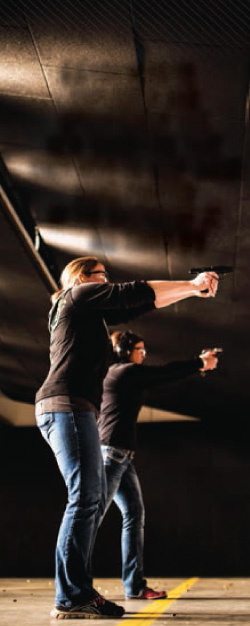 You need to explicitly and specifically tell new shooters that they need to keep their guns pointed at the backstop at all times.